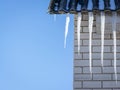 Icicles hang from the roof