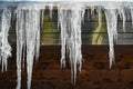 Icicles hanging from barn roof in South Germany.