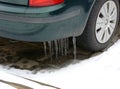 Icicles hanging from a car Royalty Free Stock Photo