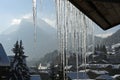 Icicles hanging down from a roof Royalty Free Stock Photo