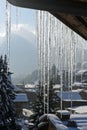 Icicles hanging down from a roof Royalty Free Stock Photo