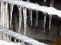 Icicles hanging from a metal wire