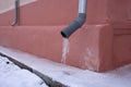 Icicles hanging on the pipe, the concept of winter Royalty Free Stock Photo