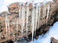 Icicles Hanging From a Rock Royalty Free Stock Photo