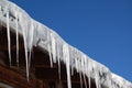 Icicles hanging from roof Royalty Free Stock Photo