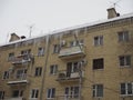 Icicles hanging from roof, dander in winter