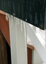 Icicles hang from a mailbox Royalty Free Stock Photo