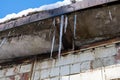 icicles and melting snow on the roof Royalty Free Stock Photo