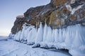 Icicles on the rocks of Oltrek island. Lake Baikal, winter