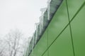 Icicles on roof. Ice on building. Icing of visor. Melting snow Royalty Free Stock Photo