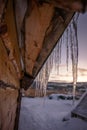 Icicles on the roof of wooden Hut Royalty Free Stock Photo