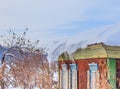 Icicles and snow on the roof of the house Royalty Free Stock Photo