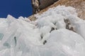 Icicles sokuy hanging over the head with a rock Olkhon Island on Royalty Free Stock Photo