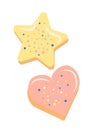Icing cookies in shape of star and heart. Cooking homemade cakes and desserts