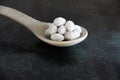 Icing Sugar coated Almonds on big Spoon Royalty Free Stock Photo