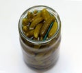 Pickles in glass jar on whuite background Royalty Free Stock Photo