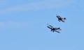 Vintage Bristol F2.B and Sopwith Camel WW1 Aircraft in flight.