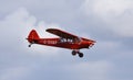 Vintage G-SVAS PA-18 1961 Piper Super Cub aircraft in flight. Royalty Free Stock Photo