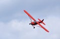 Vintage 1961 Piper Super Cub in flight close up.