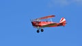 Vintage Red 1949 Stampe Vertongen Biplane in flight