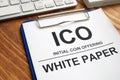 ICO initial coin offering white paper documents. Royalty Free Stock Photo