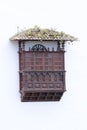 Balcony with lattice windows of a typical Canarian house in Icod de los Vinos, Tenerife. Spain Royalty Free Stock Photo