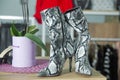 Icon ankle boots . women`s snakeskin Cowboy Boots . Snake Cowboy Ankle Boots pattern. Close View Of Fashion Casual Female shoes. Royalty Free Stock Photo