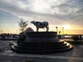 an icon of a buffalo statue above the roundabout around Losari Beach