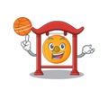 An icon of chinese gong Scroll cartoon character playing basketball Royalty Free Stock Photo