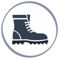 Icon of a dark blue hiking boot with white laces inside a gray circle Royalty Free Stock Photo