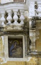 Icon depicting a madonna inserted under a Renaissance loggia historic center of Grottaglie.