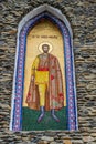 An icon on the external walls of the church of the birth of the Blessed Virgin Mary from Merry Cemetery, Sapanta, Romania Royalty Free Stock Photo