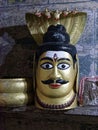 Icon and face of Hindu god Shiva in brass for worshiping at the time of festival