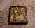 The icon hangs indoors under Calvary in the Church of the Holy Sepulchre in the Old City in Jerusalem, Israel Royalty Free Stock Photo