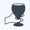 Icon Holding Wine Goblet. suitable for Hand Actions symbol. glyph style. simple design editable. design template vector. simple Royalty Free Stock Photo