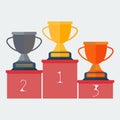 Icon pedestal with cups for the first, second and third place. Gold, silver and bronze cup. Award for champions and winners Royalty Free Stock Photo
