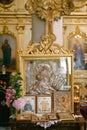 Icon of the Virgin and Child on a table in front of the altar in the church Royalty Free Stock Photo