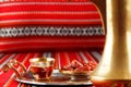 Iconic Abrian fabric tea and dates symbolise Arabian hospitality