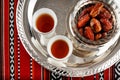 Iconic Abrian fabric tea and dates symbolise Arabian hospitality Royalty Free Stock Photo