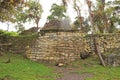 Iconic ancient stone round house ruins with unique geometric pattern on the outside wall, Kuelap archaeological site in Peru