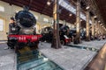 Iconic black steam engine locomotive on display at Pietrarsa National Railway Museum in Italy