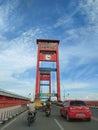 The iconic bridge in the city of Palembang, Indonesa is the Ampera Bridge