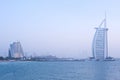 Iconic Burj Al Arab Hotel and the adjacent Jumeirah Colony. Evening scene Royalty Free Stock Photo