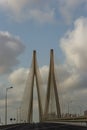 The iconic cable-stayed bridge supports soaring over the highway Royalty Free Stock Photo
