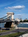 The iconic Chain Bridge in Budapest Hungary that carries traffic across the River Danube in the Baroque city of Budapest..