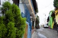 Iconic and colorful old houses and narrow streets typical of El Hatillo, where few people can be seen walking down the street