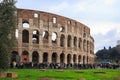 Iconic Colosseum with many visitors queuing to gain entry Royalty Free Stock Photo