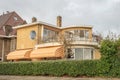Iconic dutch villa from 1932, with a cloudy sky
