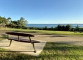 An iconic Gold Coast surfboard bench overlooking an Australian Gold Coast beach Royalty Free Stock Photo