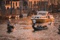 Iconic Gondolas Gliding Along the Grand Canal in Venice, Italy - Historic Waterway Royalty Free Stock Photo